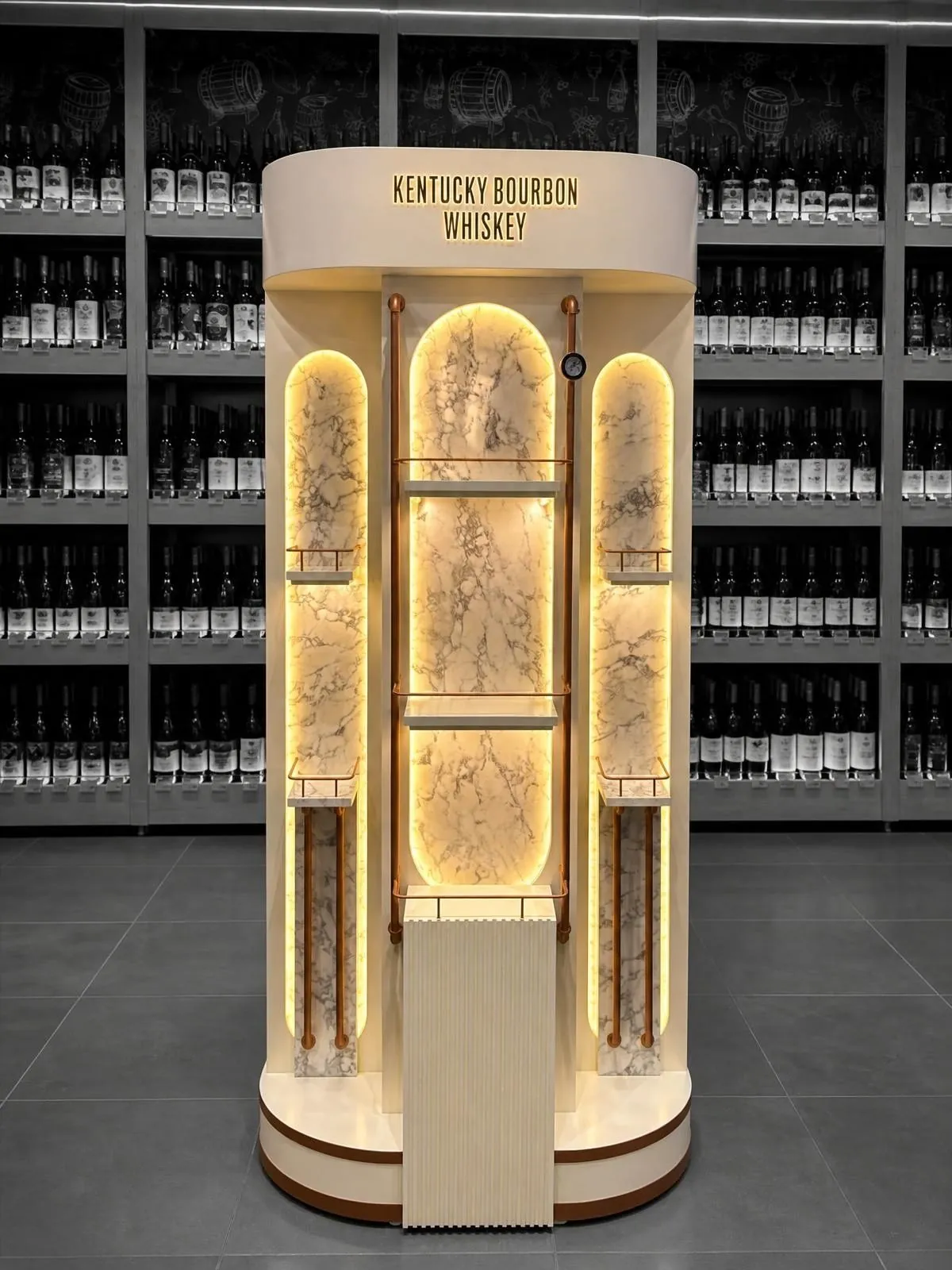 Round cream-coloured display with a lit crown, three illuminated bays and a brand header.